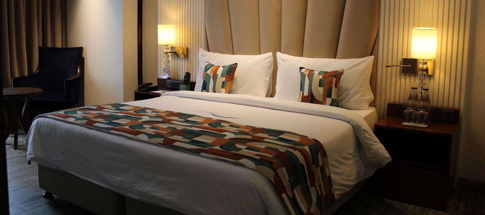 A bedroom featuring a functional working space for productivity at BluSalzz Residence, Amritsar